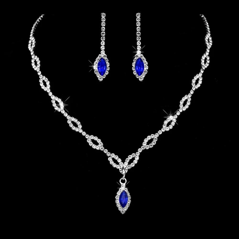 Pretty blue pendent set in white metal