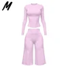 Completo Rosa con Maglia a Maniche Lunghe e Pantaloni Capri