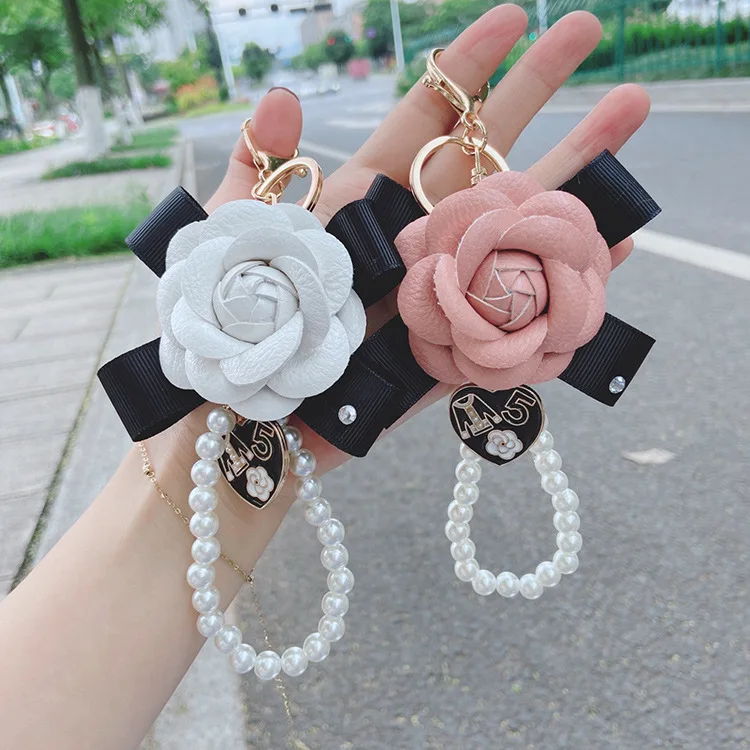 Wholesale Lilangda Hot Selling Fashion Camellia Style Key Holder PU Leather  Rose Flower Key chain camellia flower bag charm keychain From m.