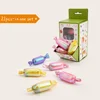 21 giocattoli colorati per caramelle + scatola espositiva