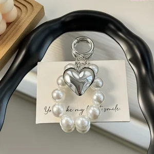 Women's Sweet Bowknot Pearl Keychain - Heart-Shaped Charm for Car Keys & Handbags (Elegant Design)
