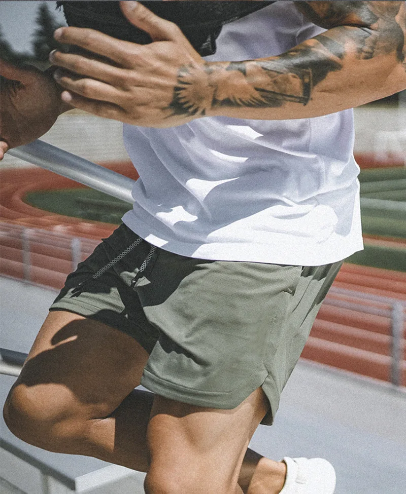 Pantaloni da palestra da corsa estivi con utensili mimetici jogger in cotone taglie forti moda casual multitasche pantaloncini da uomo671_voghion.com