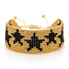 Gold with 7 black star