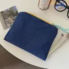 Blue and white plaid makeup bag