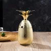 Taza de piña de oro