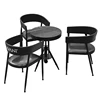 One table and three chairs