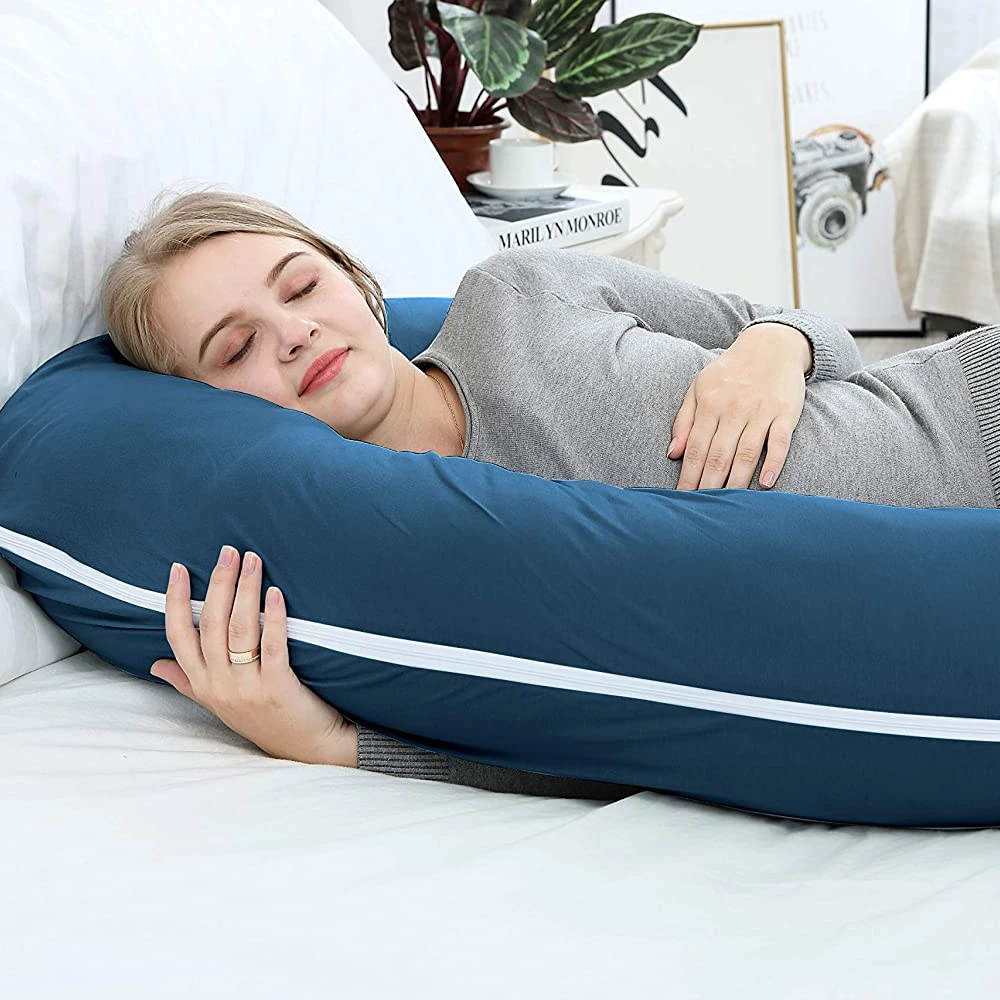 sitting with pillow behind back