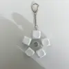 White round cap with rotary button keychain