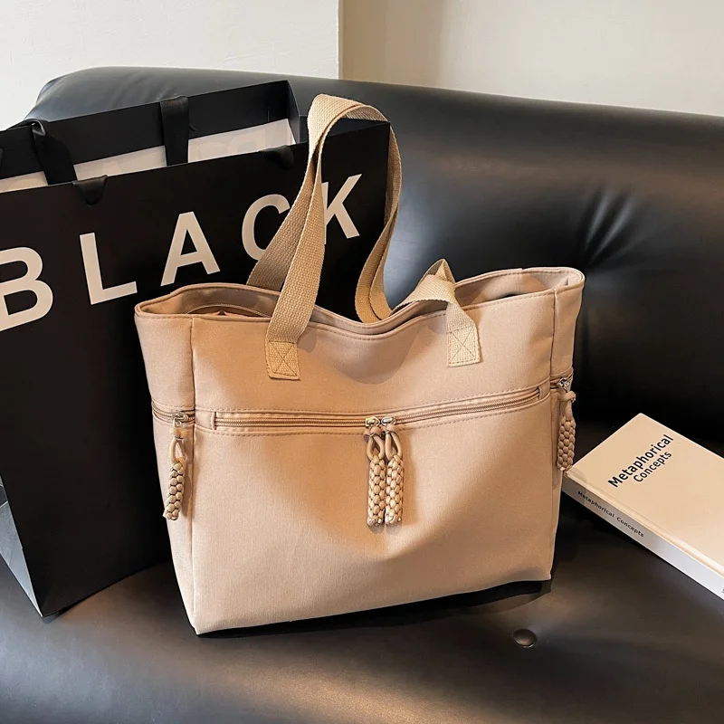 Simple Korean-style Solid Color Canvas Zipper Casual Stylish Large Capacity Winter 2026 Commuting Work Shoulder Stitching