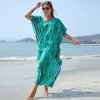 Copricostume turchese con effetto tie-dye
