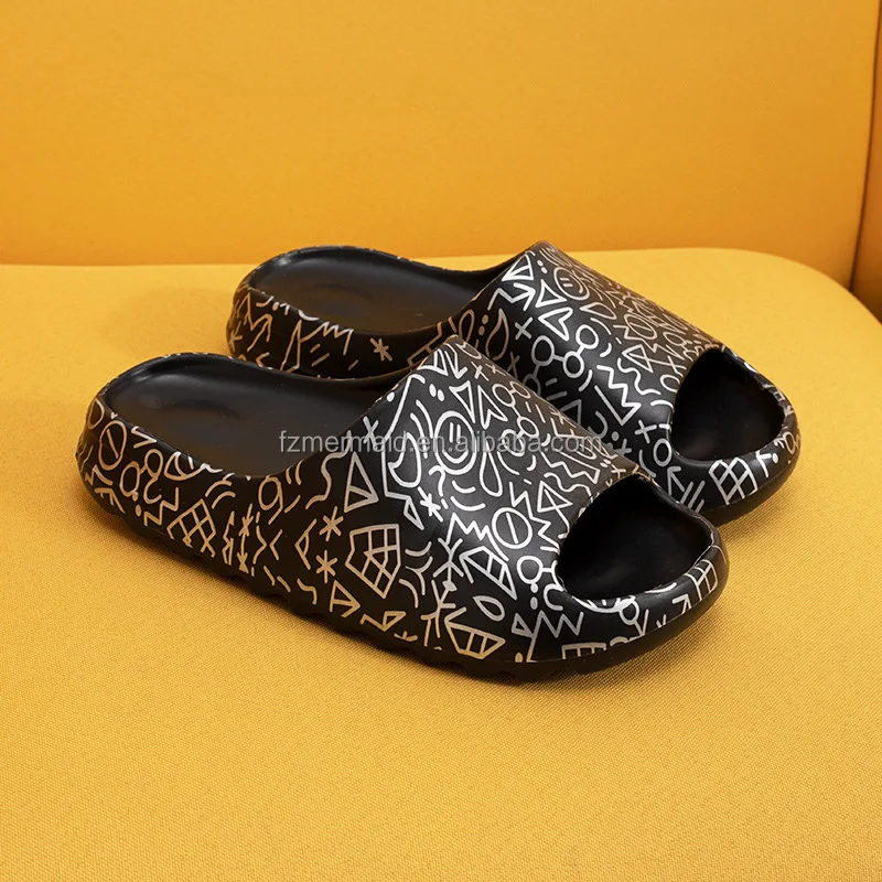 black elmo yeezy slides