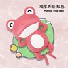 Red water-playing happy frog