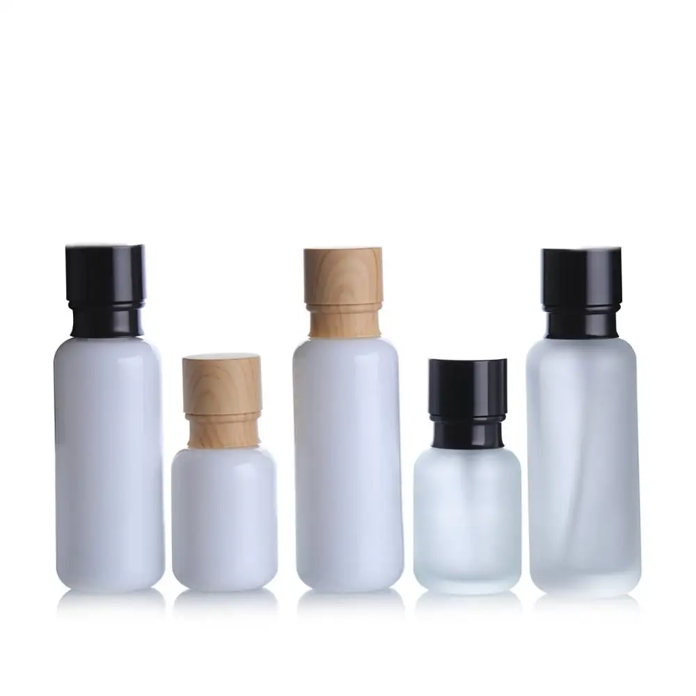 Download Empty Bottles For Vanilla Essence Frosted White Glass Cosmetic Jar Cream Lotion Bottle With Wooden Cap Essential Oil Bottle Buy White And Silver Skin Care Bottles Luxury Bottles Sets For Skin Care Empty