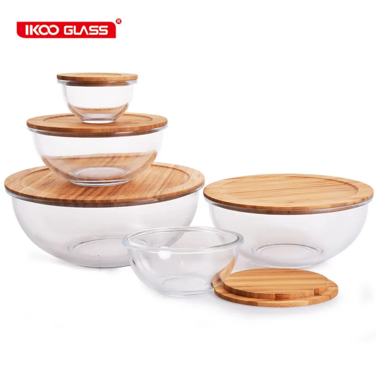 Glass mixing bowl set with bamboo lids. Oven and Microwave safe.