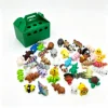 Boîte de rangement en vert + 10 petits animaux