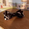0028 Clip de plátano de lunares negros