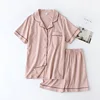 Pantaloncini in maglia tinta unita da donna - rosa