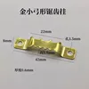 Percha dorada de doble cara con bordes dentados.