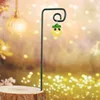 Small glow-in-the-dark yellow flower vase
