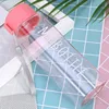 Pink bottle with round cap