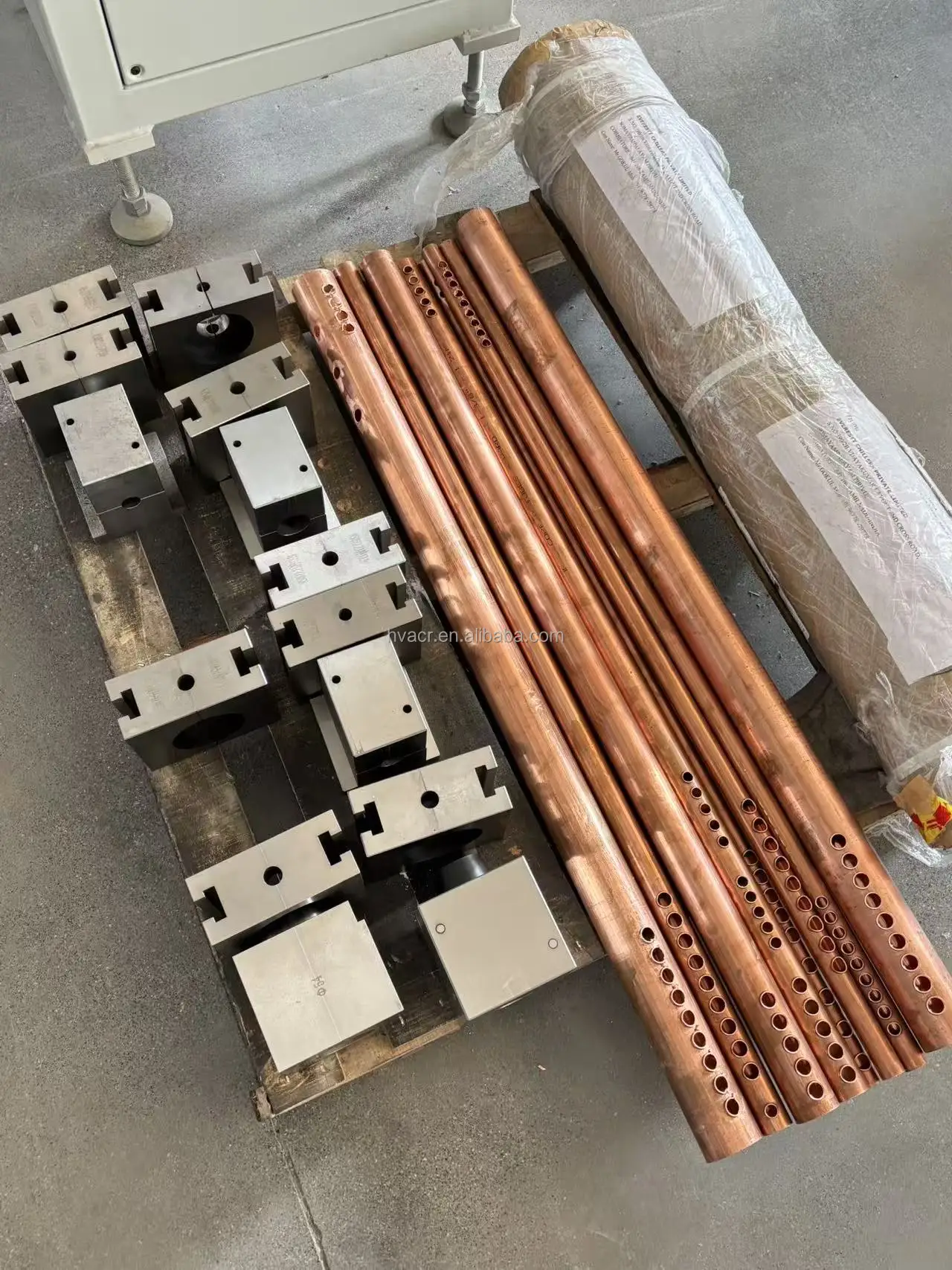 BOBO Machine copper tube hole pipe punching machine for solar shown in a detail photo for this news article