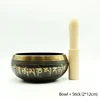 singing bowl and stick
