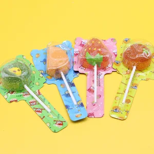 Wholesale Various Fruit Shaped Gummy Lollipops Flavored Fruity Golden Rice Candy Fun Snacks Food Coated for Various Audiences