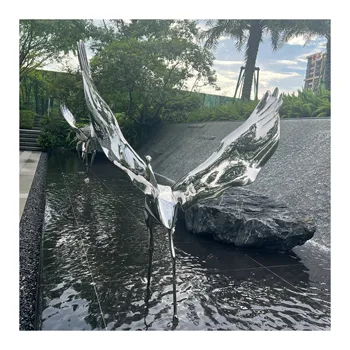 Outdoor life-size egret sculpture in stainless steel mirror