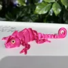 yeux de lézard rose rouge sélectionnés au hasard