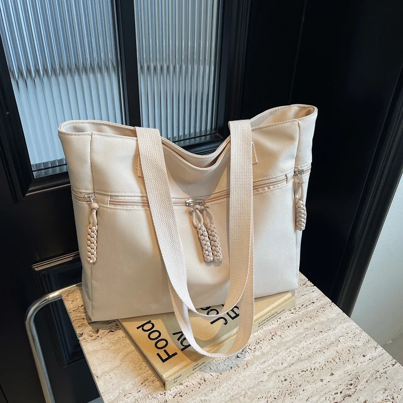 Simple Korean-style Solid Color Canvas Zipper Casual Stylish Large Capacity Winter 2026 Commuting Work Shoulder Stitching