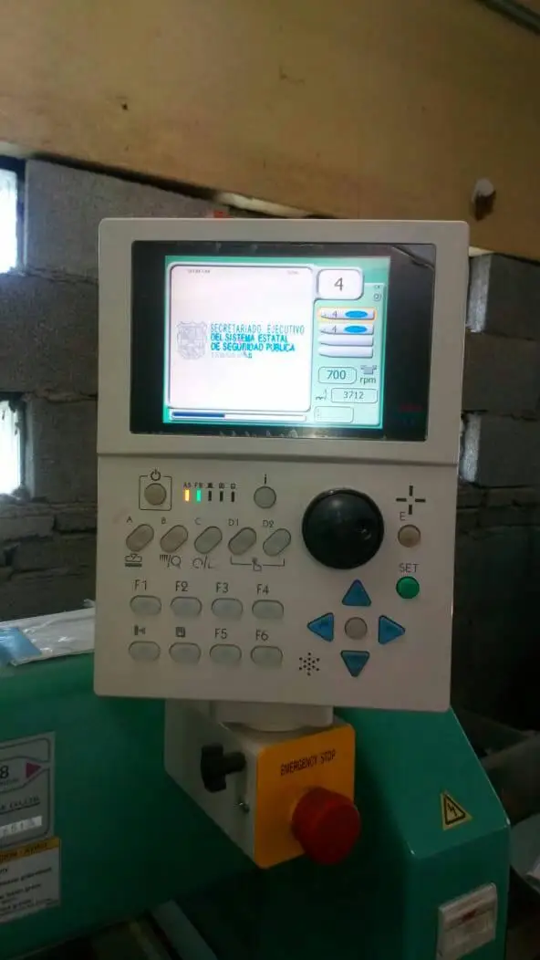 Tajima Embroidery Machines with a Backdrop of Isacord Thread
