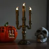 Skeleton golden candlestick