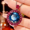 Colgante de cristal azul puntiagudo en oro negro con cadena Chopin.