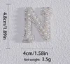 Fer blanc sur N