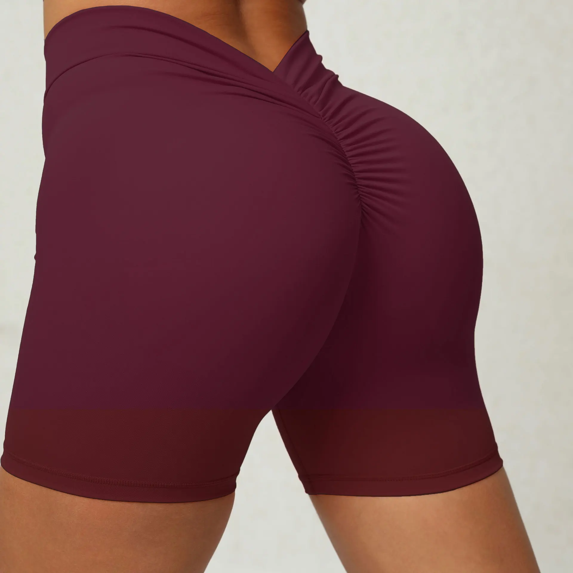 Wholesale Short back waist deep V shaped tight hip yoga shorts high quality scrunch workout shorts peach hip fitness shorts factory