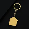 Llavero dorado con orificio de 38377 mm para llave de casa.