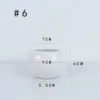 6 small round white bottles