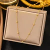 Collana a catena con 10 sfere dorate