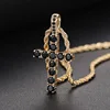 Yellow gold black stone