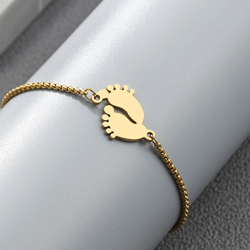 thumbnail image 2 of 9ct Yellow Gold Charm With Cut Out Footprint Design - Baby Beach Sand Theme 2 of 6