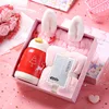Serviette rose + bandeau rose + verre en bois rose