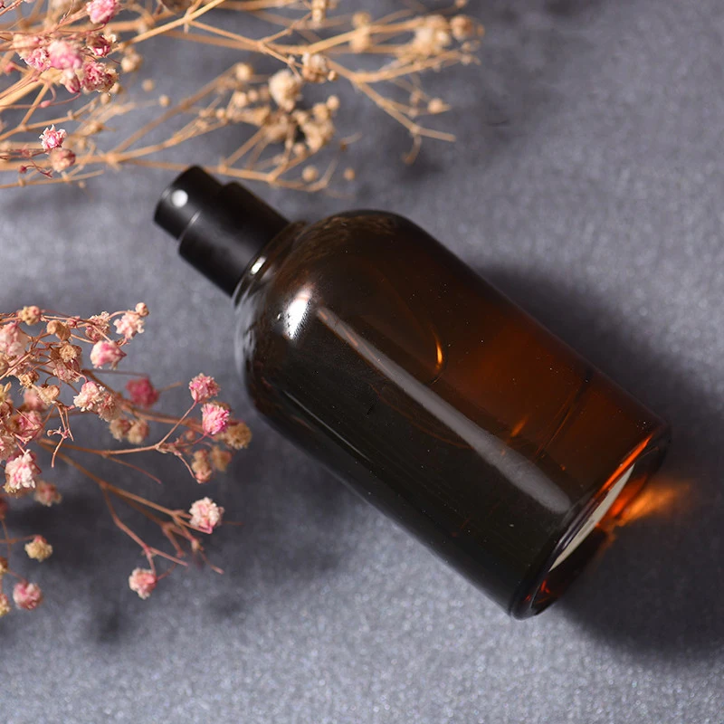 Custom 30ml 50ml 100ml Round Empty Clear Amber Fragrance Perfume Spray Glass Bottles With Black Cap