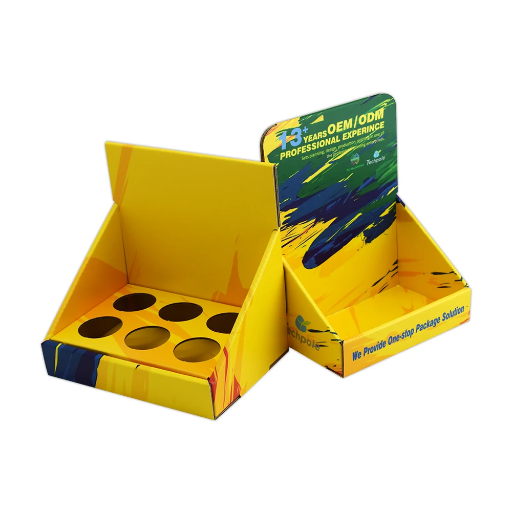 Corrugated Cardboard Retail Display Box with Matt Lamination and Embossing for Cosmetics Counter Stand with Holes