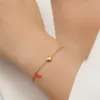 xkb2242-bracelet coeur en corde rouge or
