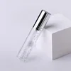 Perfume Bottle with silver lid with line