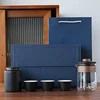 Vaso nero con tre tazze + barattolo