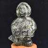 Bear Holding Fish Carving
