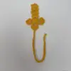 Croix de curcuma