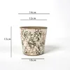 Maceta de vid verde de 1413 cm con orificios de drenaje.
