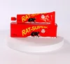 Caja roja adhesiva fuerte de 135 g.